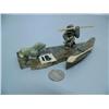 Image 1 : Soapstone carving of a hunter and seal in a kayak by James Sugar stock #201f (2)