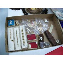 Large collection of ivory jewelry- pair of ivory earrings with gold nuggets; small ivory bird; assor