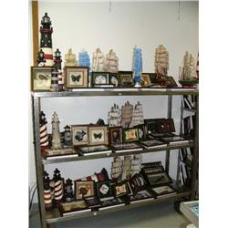 Entire cart of nautical items- 12 lighthouses; 12 model sailing ships; 44 framed items consisting of
