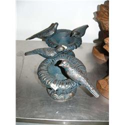 Pair of cast iron bird baths with birds (500)