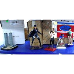 O. J. Simpson statue; Batwoman statue; World Trade Center commemorative; 2 statues (60)