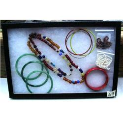 Lot of jewelry: old trade beads; 3 jade bangle bracelets; fresh water pearl necklace; etc. (74)