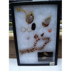 Lot of costume jewelry: copper necklace; assorted pendants; etc. (74)