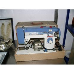 White portable sewing machine (74)