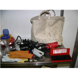 Carpenter's bag with 2 drills; heat gun; set of deep well sockets; head lamp; 2 pairs of leather glo