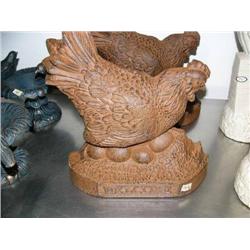 CHOICE on 2 cast iron chicken door stops (500)