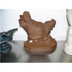 CHOICE on 2 cast iron chicken door stops (500)