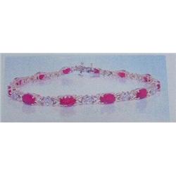 Ruby and Diamond Bracelet 10 K yellow gold- rubies are oval, faceted approx. 4.50 carats, translucen
