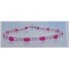 Image 1 : Ruby and Diamond Bracelet 10 K yellow gold- rubies are oval, faceted approx. 4.50 carats, translucen