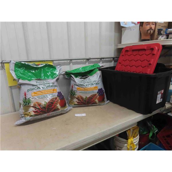 (2) Bags Indoor Potting Soil ( opened) ,  1 Tuff Store Bin with Lid - 102L