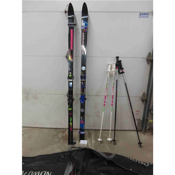 2 Sets of Skis + Poles Includes Salomon Bag