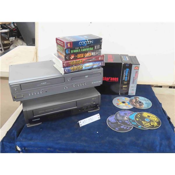 Magnavox VCR + DVD Player, Assorted VHS + DVDs & Toshiba VCR Player