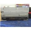 Image 2 : Magnavox VCR + DVD Player, Assorted VHS + DVDs & Toshiba VCR Player