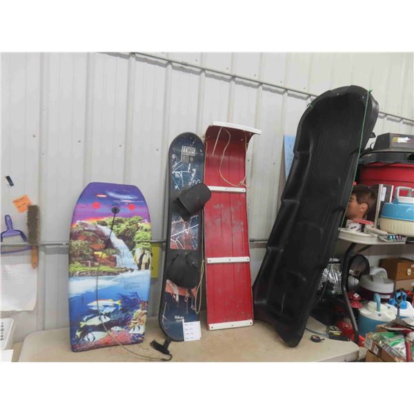 4 Items; 66" Poly Sleigh, 60" Metal Sleigh, Snowboard, Wake Board