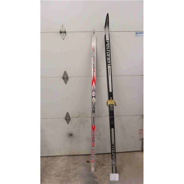 2 Pairs of Skis ; Salomon + Peltonon Fiberglass