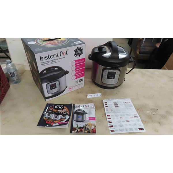 Used Instant Por 6 Quart - used a few times - Comes with Recipe Book + User Manual