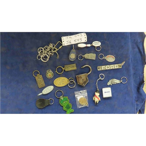 Box of Keychains Advertising ; Ford, Vickie's Snack Bar in Beausejour, plus others & 
