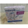 Image 1 : New Water Pik Water Flosser Cordless with 5 Attachments