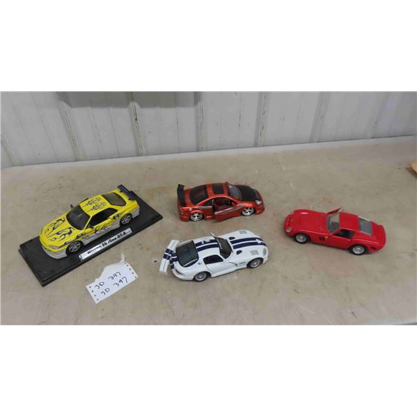 4 Die Cast Cars ; Ferrari GTO. 03 Mitsubishi Eclipse, Dodge Viper, Nissan Skyline