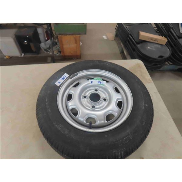 New or Like New Dunlop Tire P175 / 70 R 13 with Rim