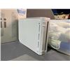 Image 2 : NINTENDO WII CONSOLE WITH 5 ASSORTED GAMES, WIIMOTES, & MORE