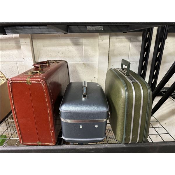 3 vintage suitcases