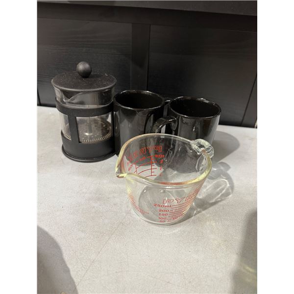 Press , mugs and measuring cup