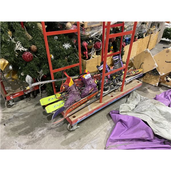 ASSORTED SKIS, BOOTS, & BINDINGS *MOBILE CART NOT INCLUDED*