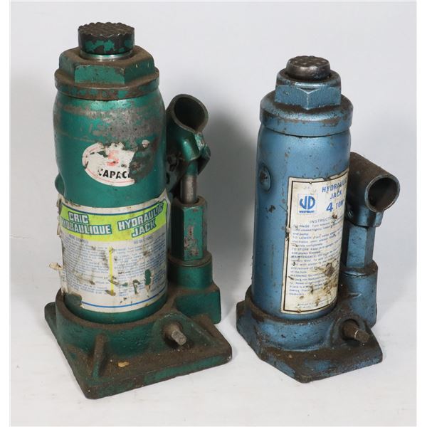 TWO BOTTLE JACKS (MISSING POLES)