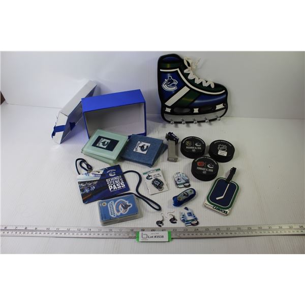 Canucks Souvenir Items - Pez - NHL Pucks - Coasters - Earrings - Misc. Items