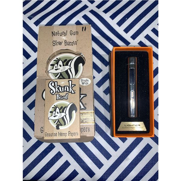 Lot of rolling papers and stick lighter