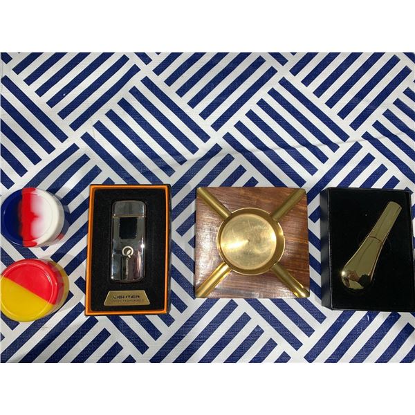 Mixed lot with lighter, ash tray, pipe and 2 silicone storage containers