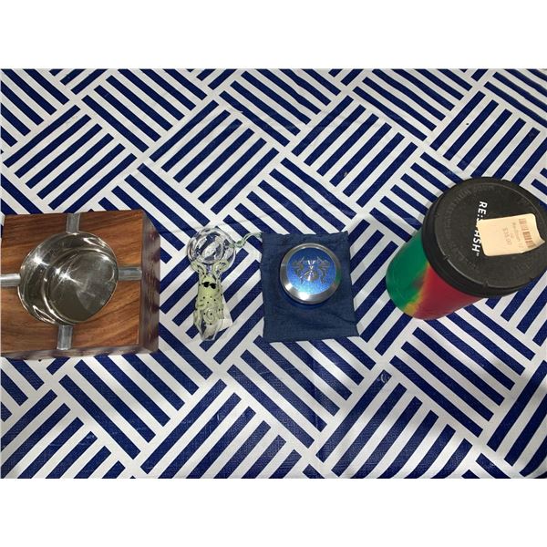 Mixed lot with ash tray, glass pipe, herb grinder and silicone/glass storage container