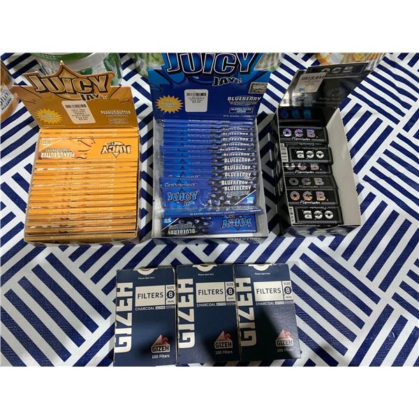 Lot of rolling papers and filter tips