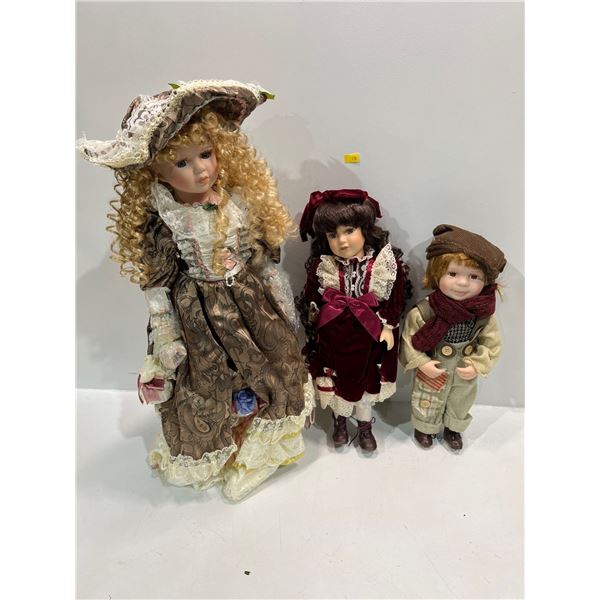 Collection of Three Porcelain Dolls 25H 18H and 14H