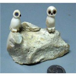 Pair of ivory owls, stock #175f mounted on walrus jaw bone with inset baleen eyes (2)