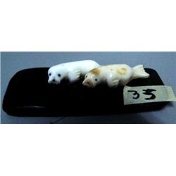 Stock #540c, pair of seals with inlaid baleen eyes by Robert Apatiki (2)