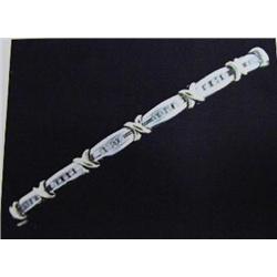 Diamond Bracelet 10 K yellow and white gold- diamonds are round brilliant cut approx. 1.00 carats- e