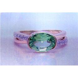 Peridot and Diamond Lady's Ring 14 K yellow gold- peridot is oval, faceted approx. 2.00 carats, tran