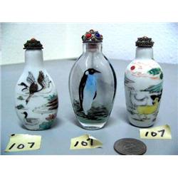 Lot of 3 snuff bottles: 2 China porcelain; 1 reverse glass painted from the inside (2)