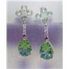 Image 1 : Peridot and Diamond Earrings 14 K yellow gold- peridot are pear and round, faceted approx. 2.50 cara