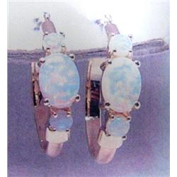 Opal Hoop Earrings 14 K yellow gold- opals are round and oval cabochon approx. 1.25 carats, semi-tra