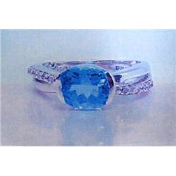Blue Topaz and Diamond Lady's Ring 14 K white gold- blue topaz is oval, faceted approx. 2.00 carats,