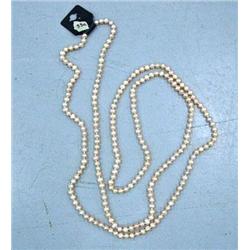 CHOICE on 2 pink fresh water pearl necklaces, approx. 64" long (2)