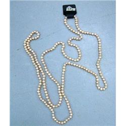 CHOICE on 2 pink fresh water pearl necklaces, approx. 64" long (2)