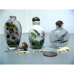 Lot of 3 snuff bottles: 1 China porcelain; 2 reverse glass painted from the inside (2)