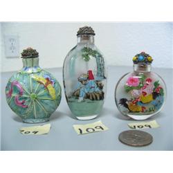 Lot of 3 snuff bottles: 1 China porcelain; 2 reverse glass painted from the inside (2)