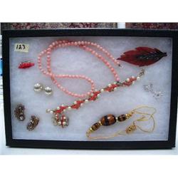 Display box of costume jewelry (74)