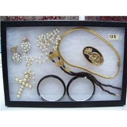 Display box of costume jewelry (74)