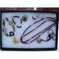 Display box of costume jewelry (74)